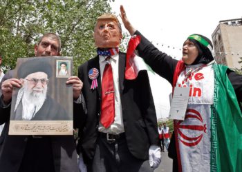 Iranian demonstrators carry a portrait of Iran's Supreme Leader Ayatollah Ali Khamenei and an effigy of US President Donald Trump during a rally in the capital Tehran, on May 10 2019. - Iranian foreign minister blamed the EU for the decline of Tehran's nuclear accord with world powers and insisted the bloc "should uphold" its obligations under the pact in which Iran agreed to curb its nuclear ambitions in return for sanctions relief.
US President Donald Trump pulled the United States out of the agreement in May of last year and reinstated unilateral economic sanctions. (Photo by STR / AFP)        (Photo credit should read STR/AFP/Getty Images)