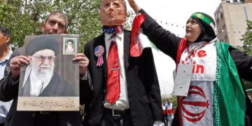 Iranian demonstrators carry a portrait of Iran's Supreme Leader Ayatollah Ali Khamenei and an effigy of US President Donald Trump during a rally in the capital Tehran, on May 10 2019. - Iranian foreign minister blamed the EU for the decline of Tehran's nuclear accord with world powers and insisted the bloc "should uphold" its obligations under the pact in which Iran agreed to curb its nuclear ambitions in return for sanctions relief.
US President Donald Trump pulled the United States out of the agreement in May of last year and reinstated unilateral economic sanctions. (Photo by STR / AFP)        (Photo credit should read STR/AFP/Getty Images)