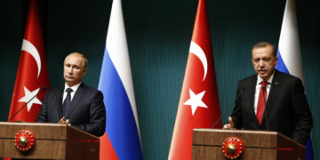 Russia's President Vladimir Putin and Turkey's President Tayyip Erdogan attend a news conference at the Presidential Palace in Ankara December 1, 2014. REUTERS/Umit Bektas (TURKEY - Tags: POLITICS) - RTR4GAUT